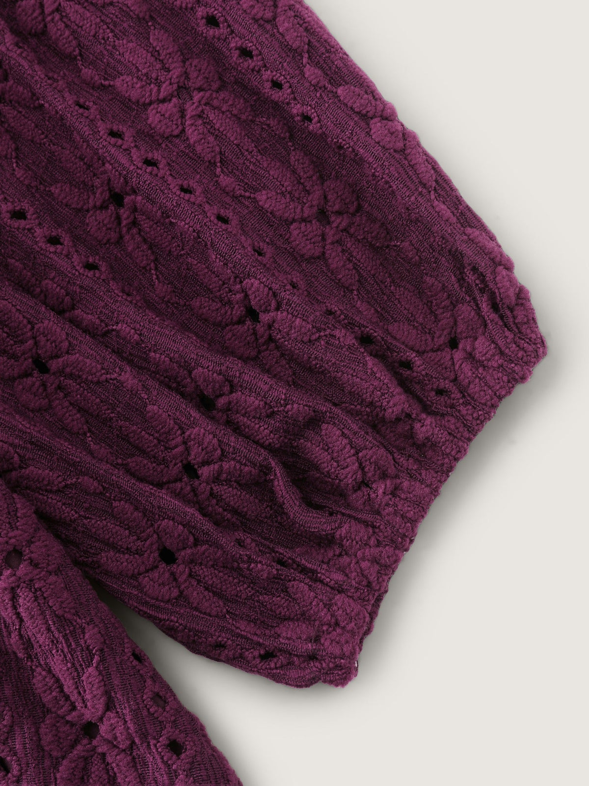 Textured Eyelet V‑Neck Peplum Blouse