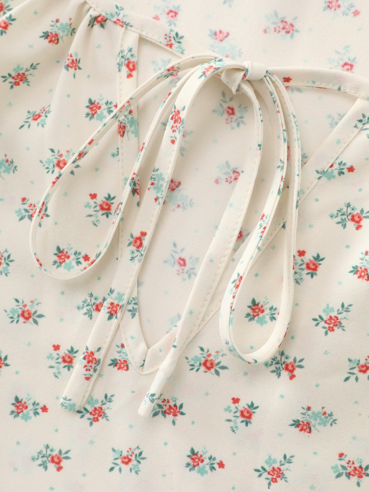 Ditsy Floral V Neck Ruffle Blouse
