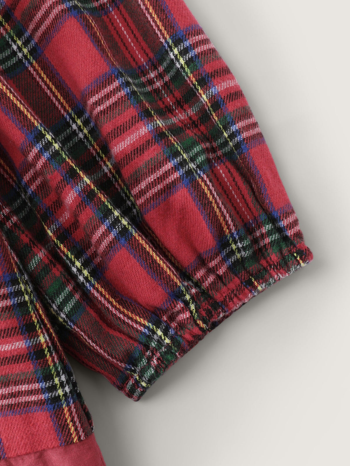 Plaid Ruffle Neck Eyelet Hem Blouse