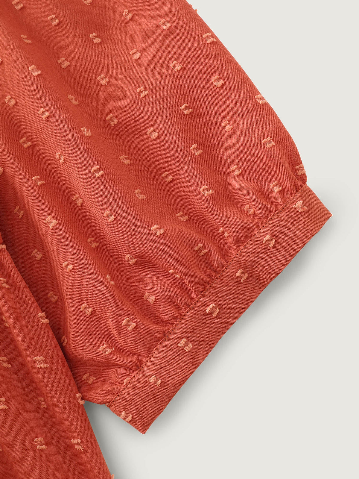 Textured V‑Neck Tie Front Pleated Blouse